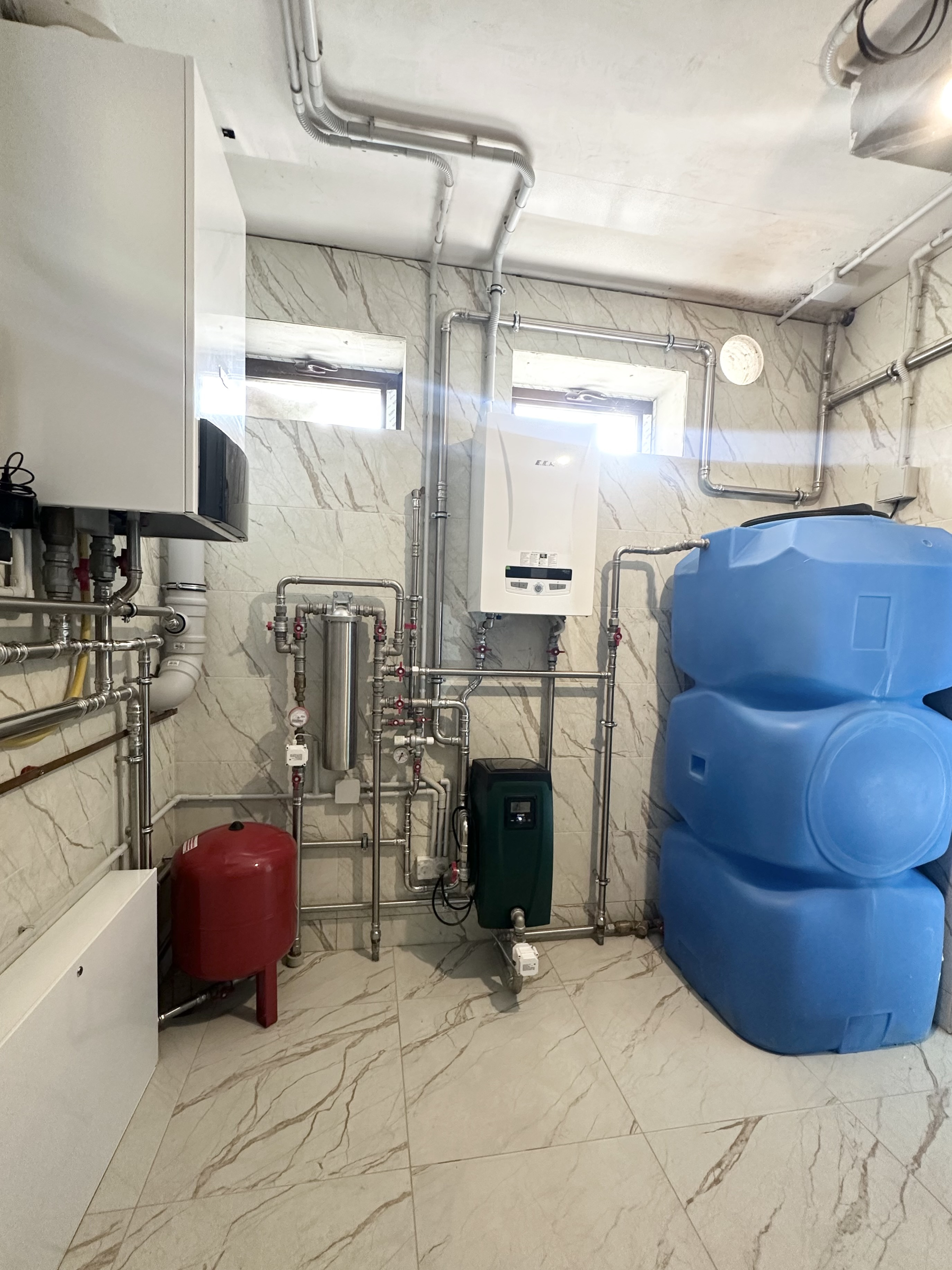 Котельная в доме 400 м2 на базе двух котлов Wolf с погодозависимой автоматизацией