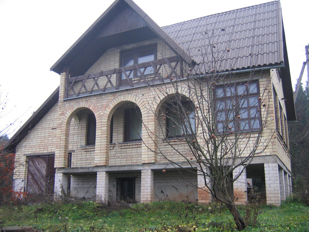 Реконструкция кирпичного дома с арками.