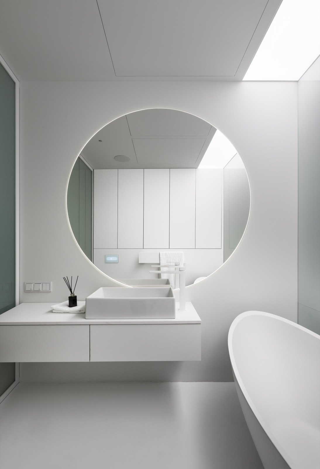 Stylish monochromatic white penthouse