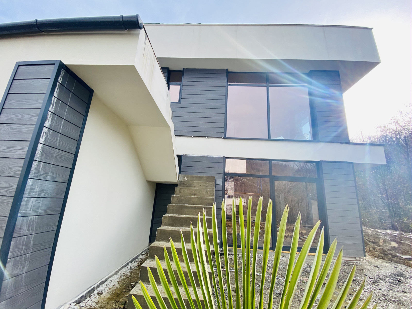 Отделка фасадов коттеджного поселка