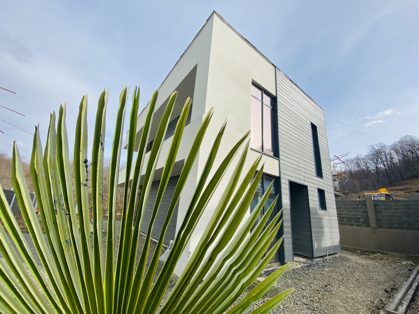 Отделка фасадов коттеджного поселка