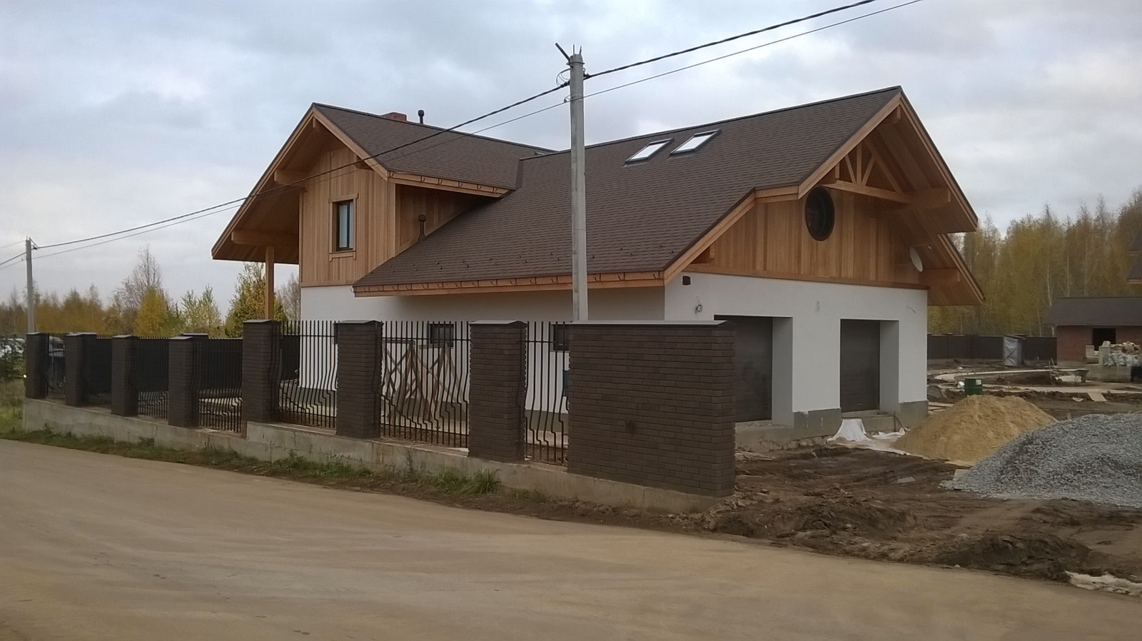 Гараж на две машины с жилой мансардой