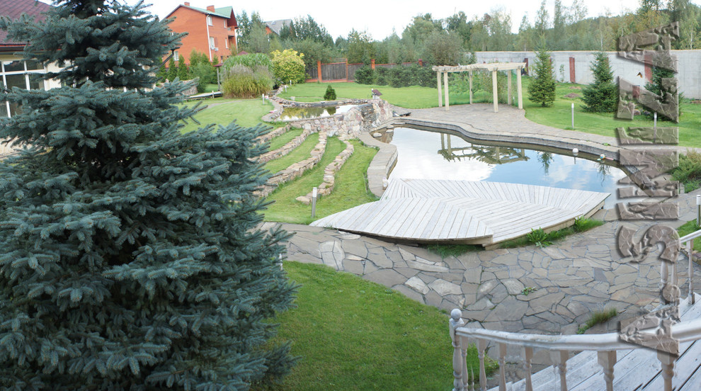 the house on the terraces with a pond near Moscow. The area 5000 sq m