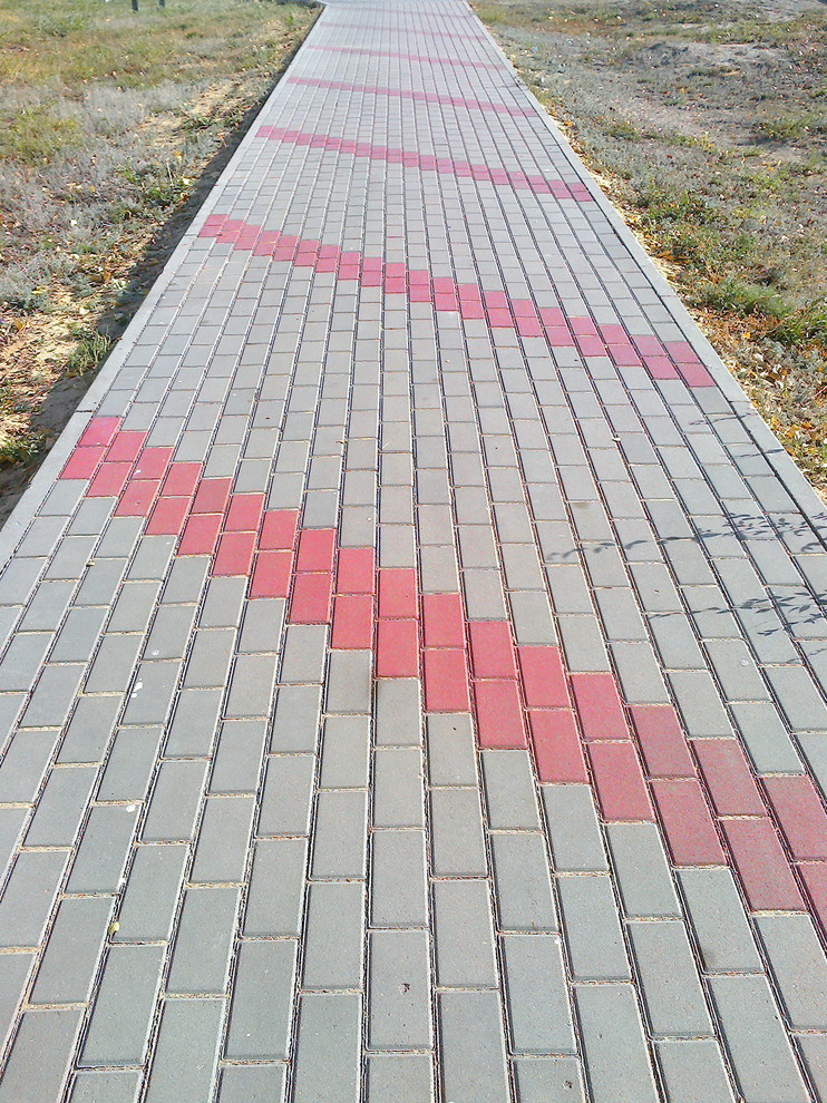 Укладка тротуарной плитки фото