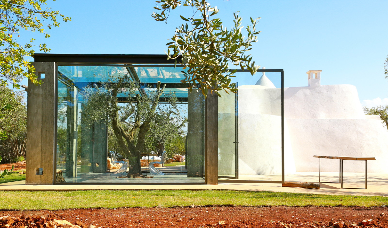 Houzz Италия: Дом-трулло со стеклянной пристройкой