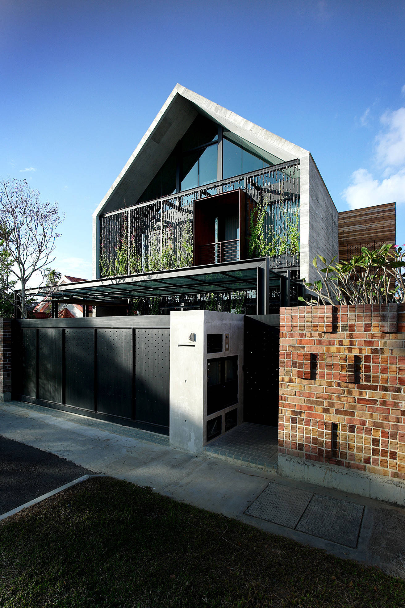 Houzz Сингапур: Дом с крышей из бетона и азбукой Морзе