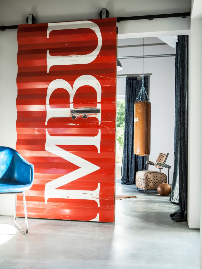 Карготектура: Дома из морских контейнеров — настоящих и имитаций