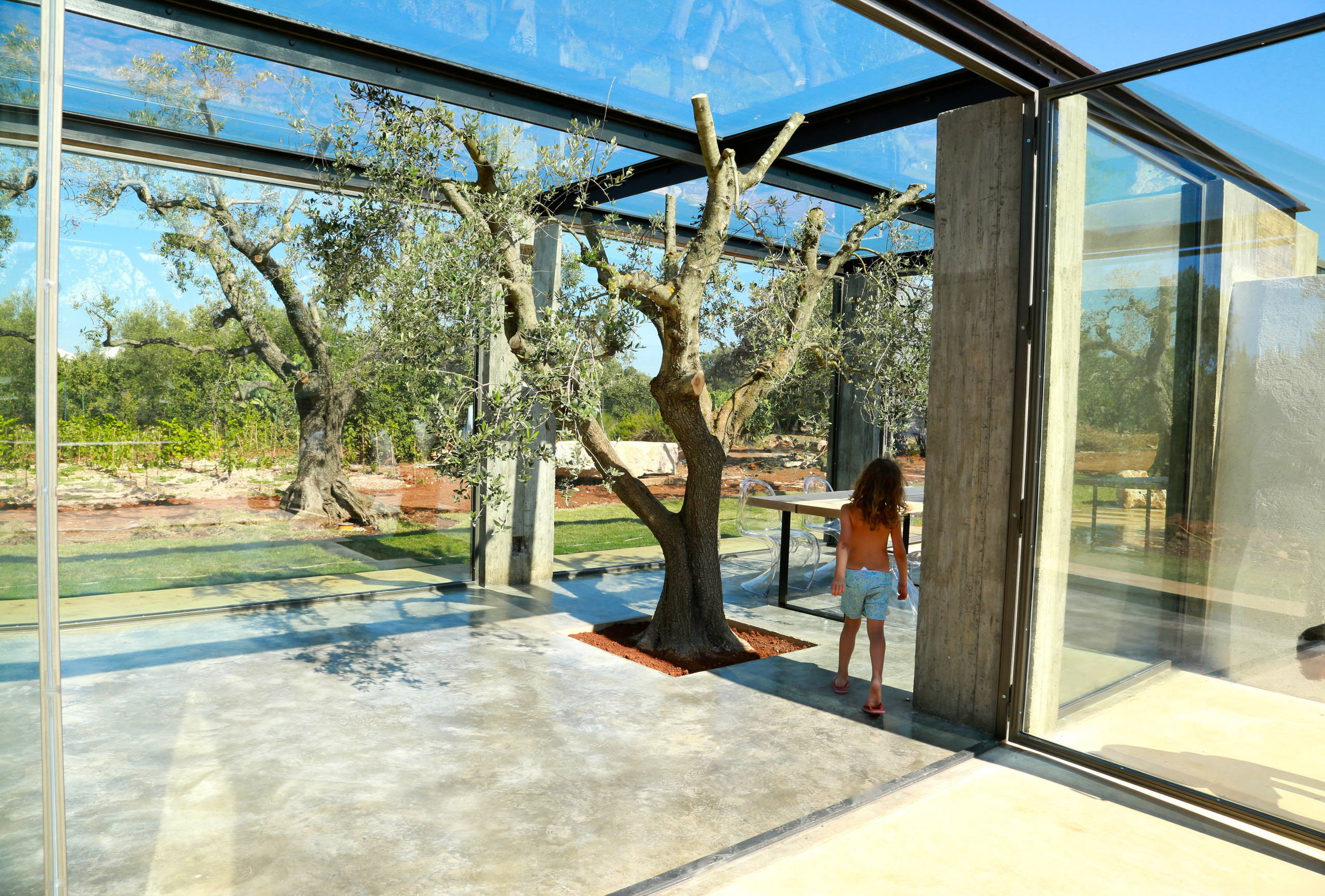 Houzz Италия: Дом-трулло со стеклянной пристройкой