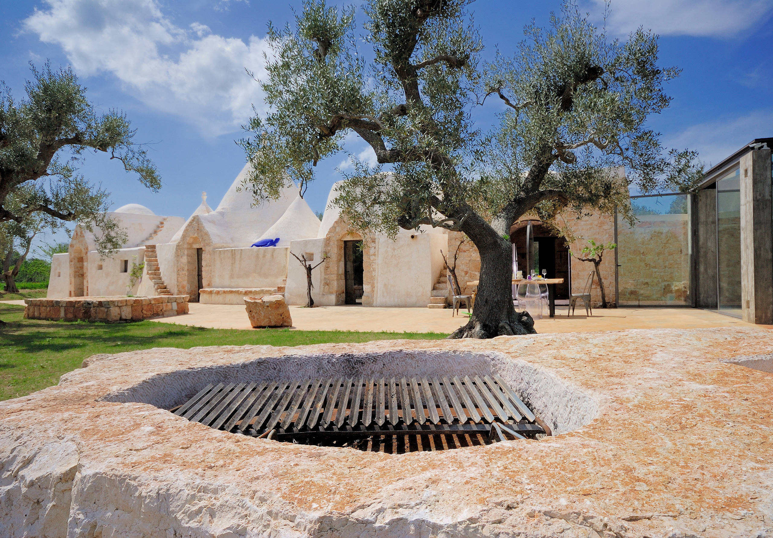 Houzz Италия: Дом-трулло со стеклянной пристройкой