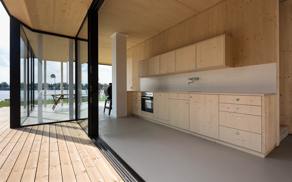 Houzz Австрия: Черный дом на озере — для трех семей