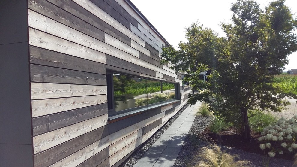 Houzz Австрия: Деревянный дом с «зеленой» крышей под Веной