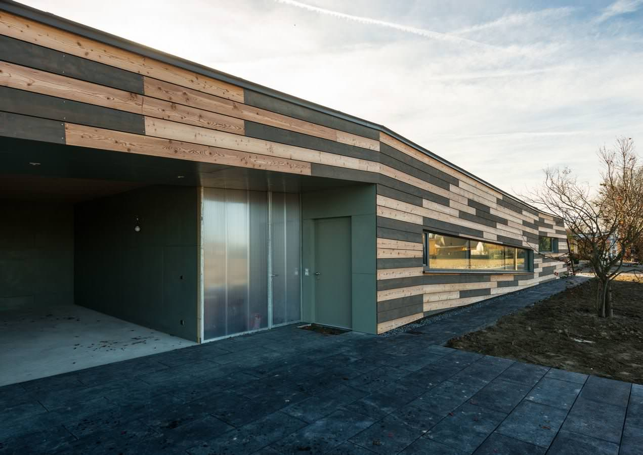 Houzz Австрия: Деревянный дом с «зеленой» крышей под Веной