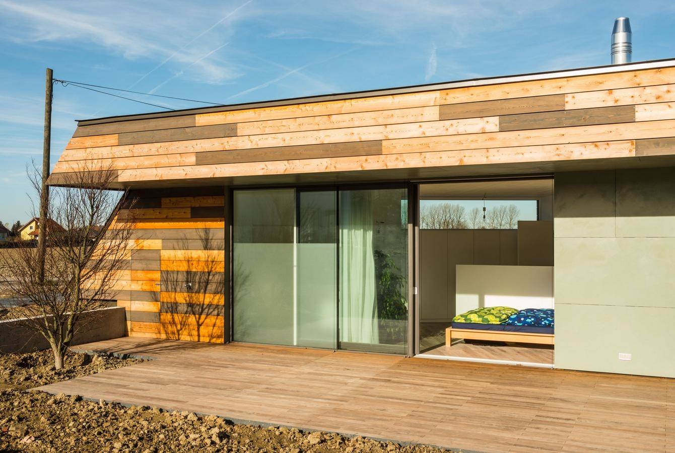 Houzz Австрия: Деревянный дом с «зеленой» крышей под Веной