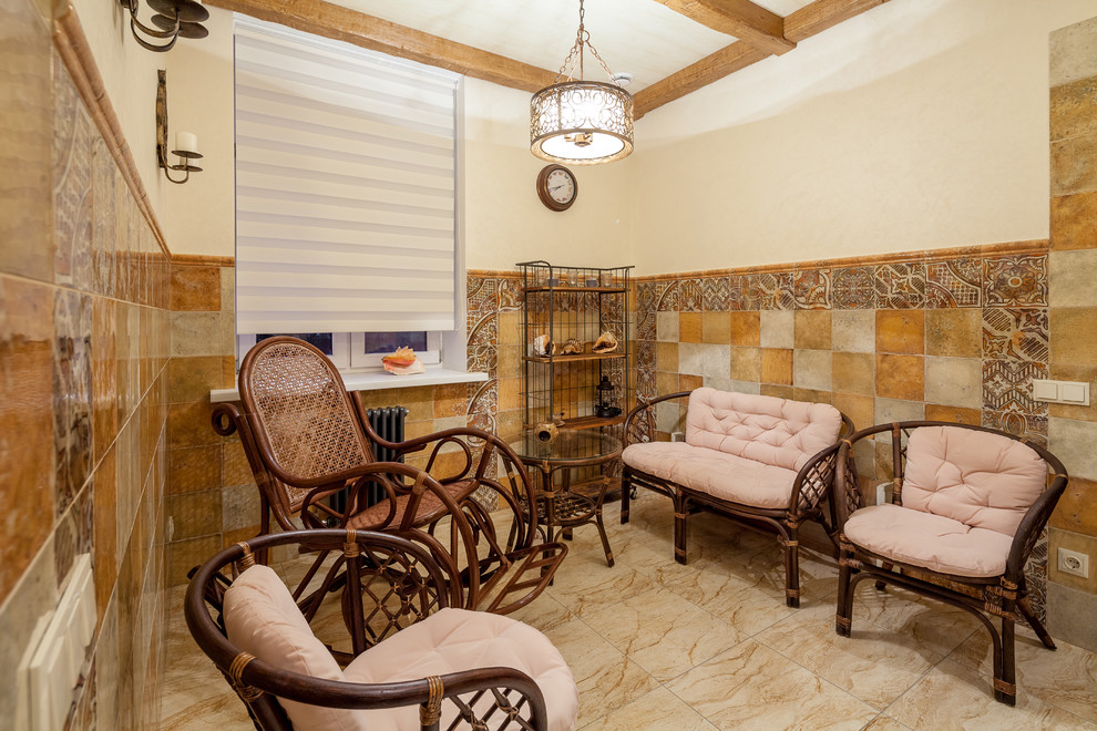 Двухэтажный дом с цокольным этажом и мансардой