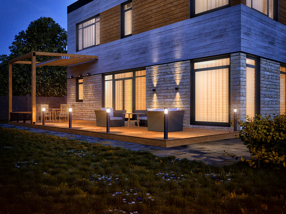 Фасад и терасса современного загородного дома