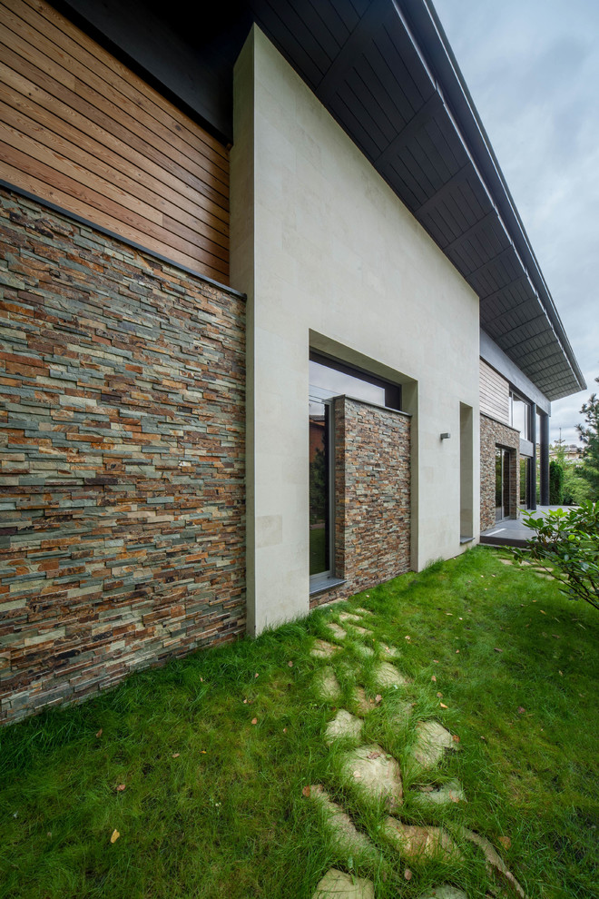 Современный загородный дом "Wing house"