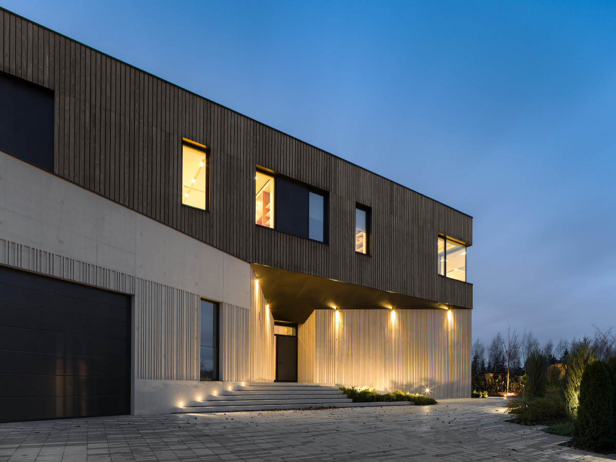 Дом из архитектурного бетона в поселке “Миллениум Парк”