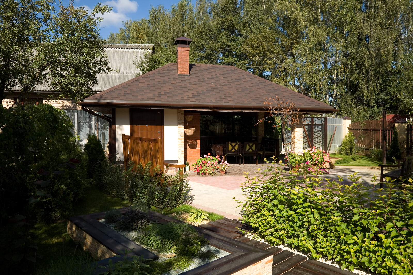 Беседка в стиле Шале на участке коттеджа