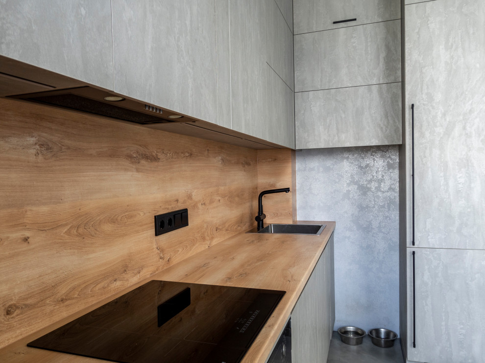 Элегантная минималистичная кухня в сером цвете