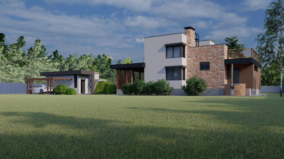 Общий вид бани и гаража на участке.