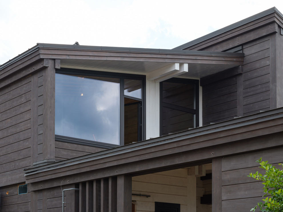 Трапецевидные окна, порталы и входные двери для современного дома