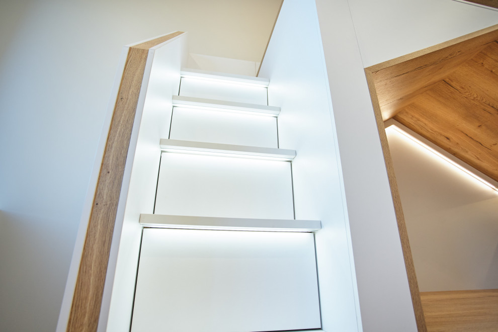 Детская двухъярусная кровать-домик с системами хранения от raumplus