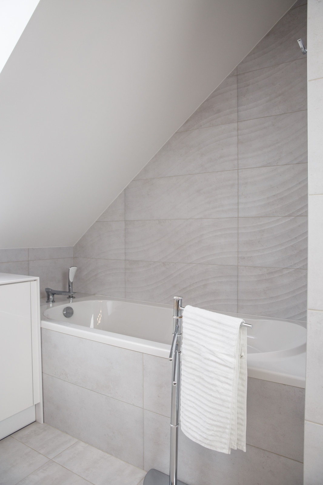 Двухэтажная квартира с мансардным потолком