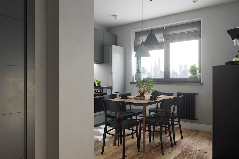 В зоне готовки поверхность пола выложена фигурной плиткой под камень, которая пл