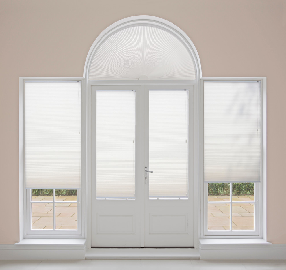 Не квадрат: Какие шторы подойдут окну арочной формы