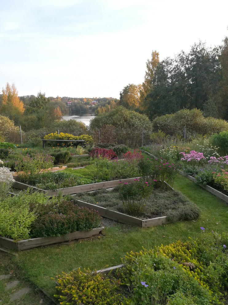 Озеленение рельефного участка в Токсово