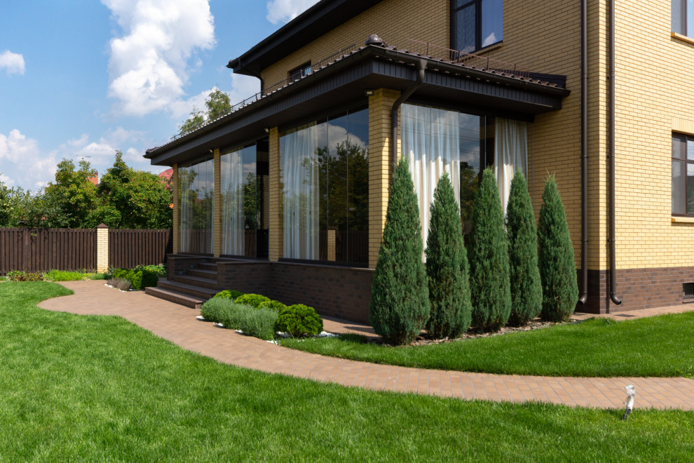 Классическая терраса с безрамным остеклением