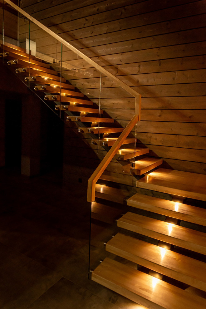 Лестница на монокосоуре со стеклянным ограждением