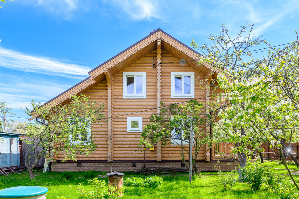 отделка дома из оцилиндрованного бревна