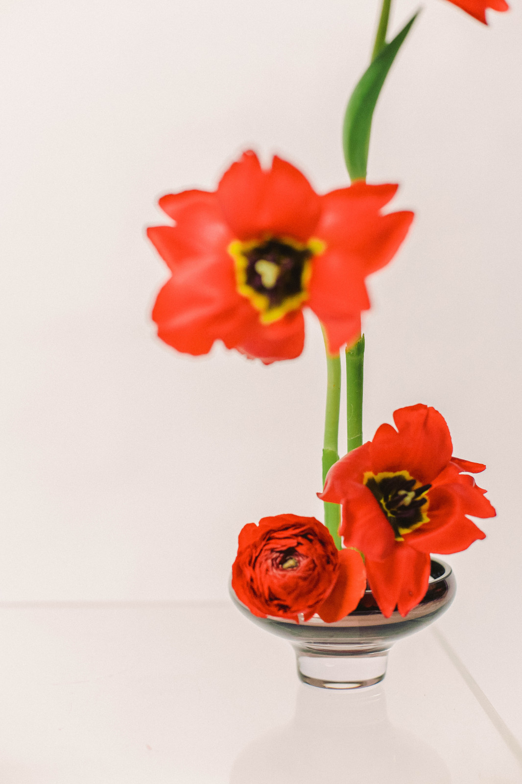 Flower arrangements in an&angel glass