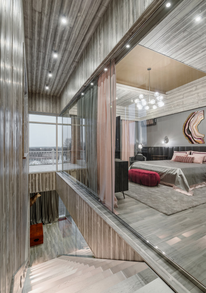 Лестница с видом на спальню брутального гостевого дома