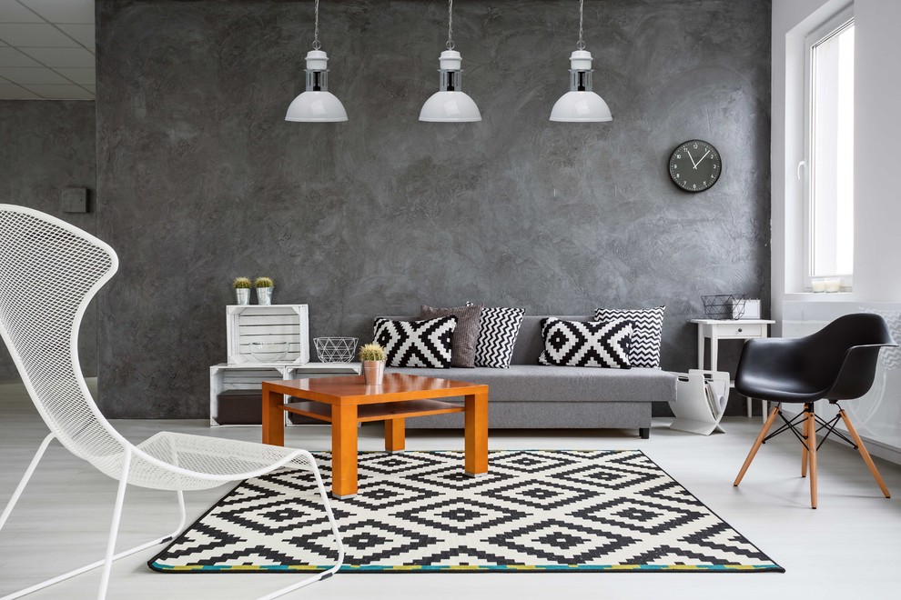 Гостиная в скандинавском стиле с бетонной стеной