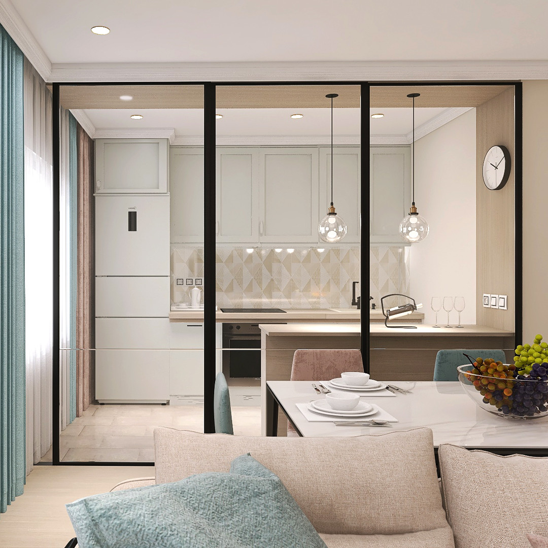 зона кухни отделена раздвижной стеклянной перегородкой