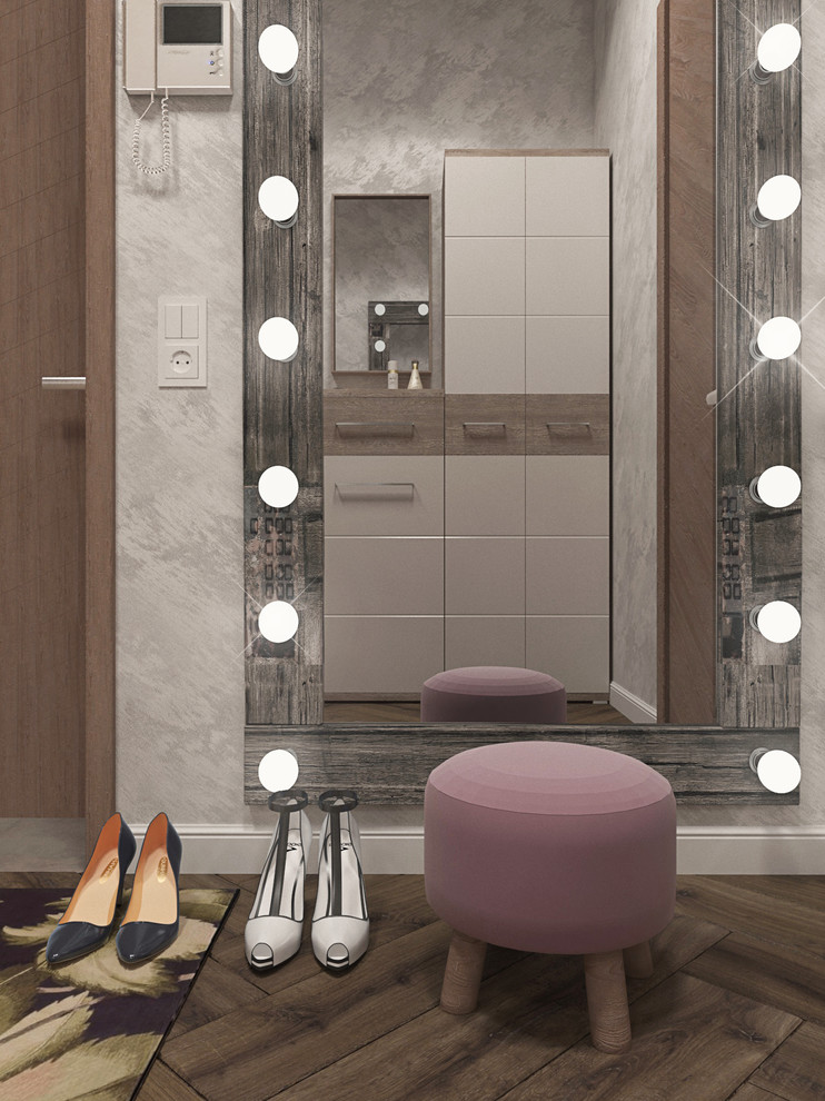 Прихожая с гостиной в однокомнатной квартире