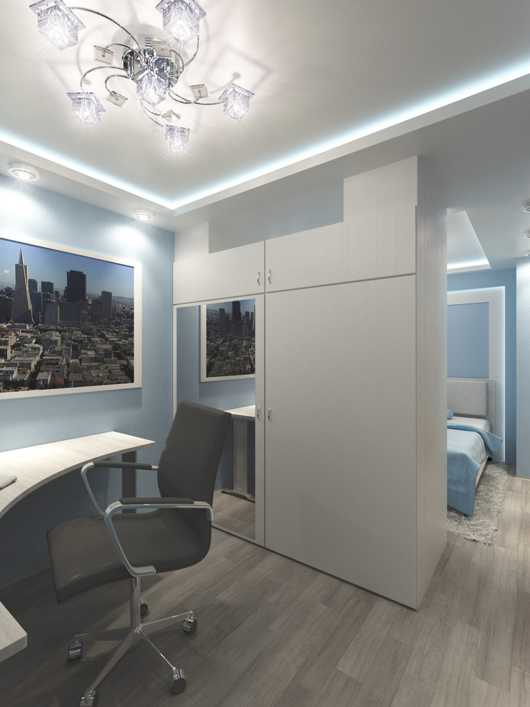 Уютная и многофункциональная комната в голубых тонах.