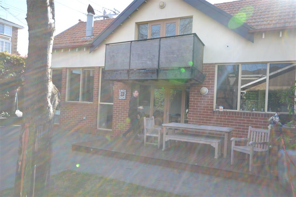 До и после: Черная кухня с островом на кирпичных ножках