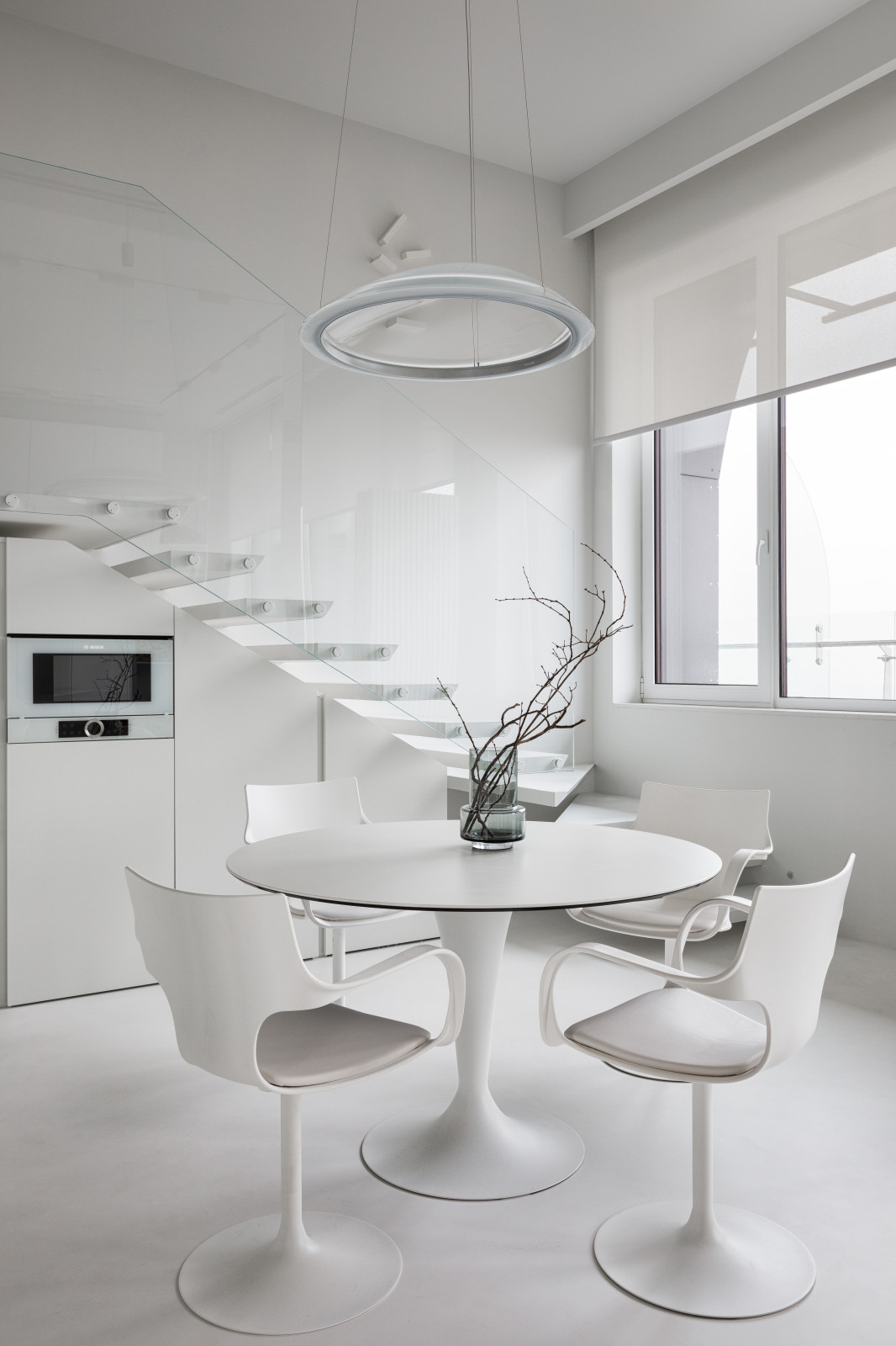 Stylish monochromatic white penthouse