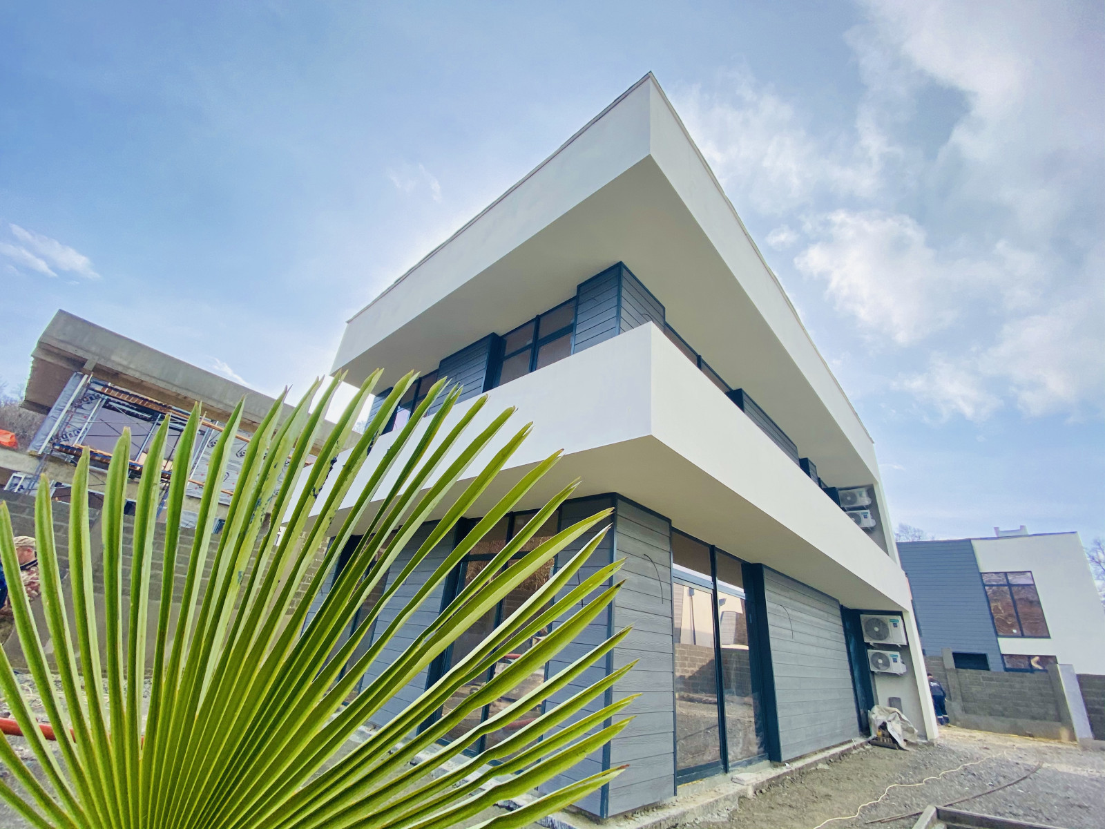 Отделка фасадов коттеджного поселка