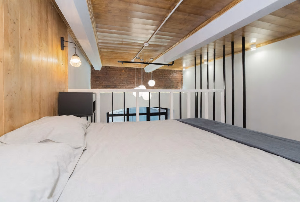 Двухэтажная студия, обшитая деревом