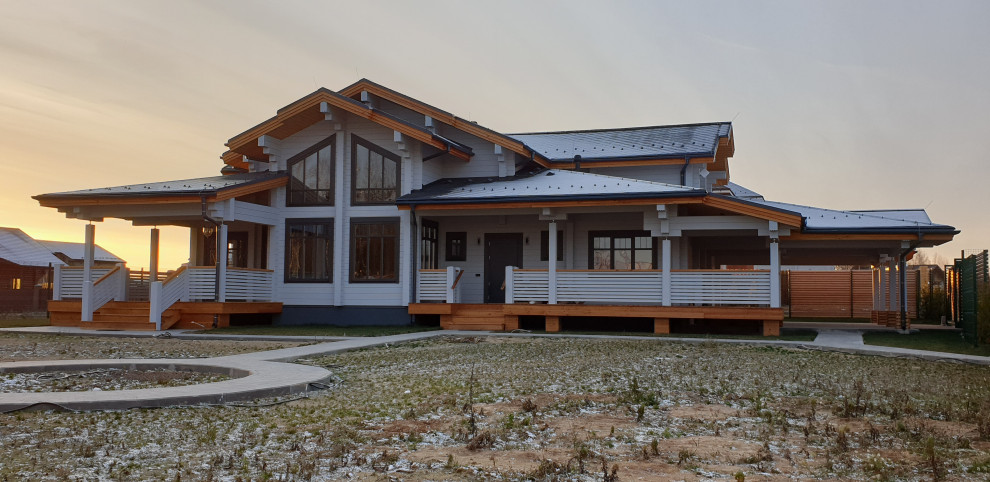 Обложка проекта: Дом из клееного бруса с навесом для машин 426 м.кв.