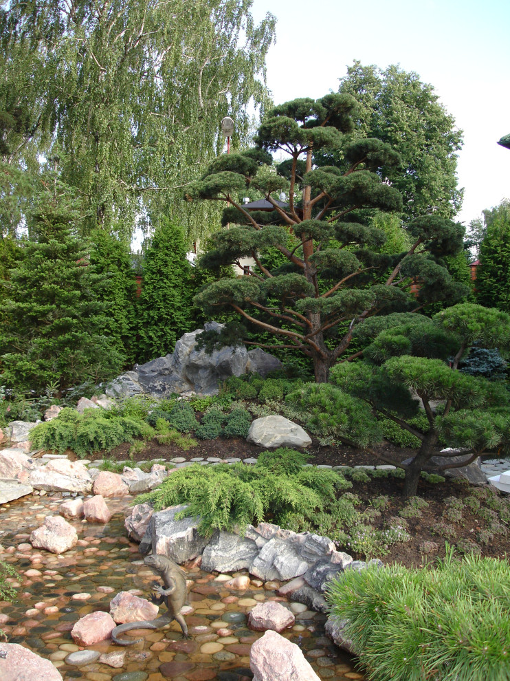 Сад с водопадом. Калчуга 2006 г