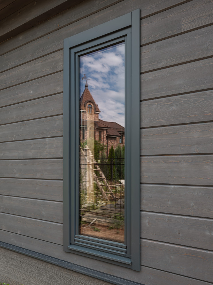 Трапецевидные окна, порталы и входные двери для современного дома