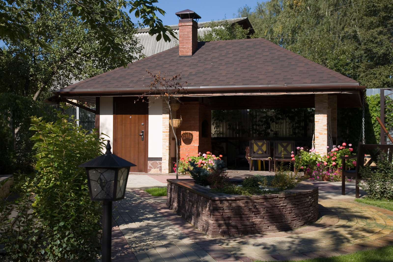 Беседка в стиле Шале на участке коттеджа