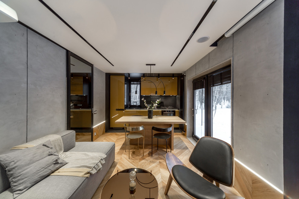 Глянцевая кухня с бетонной стеной