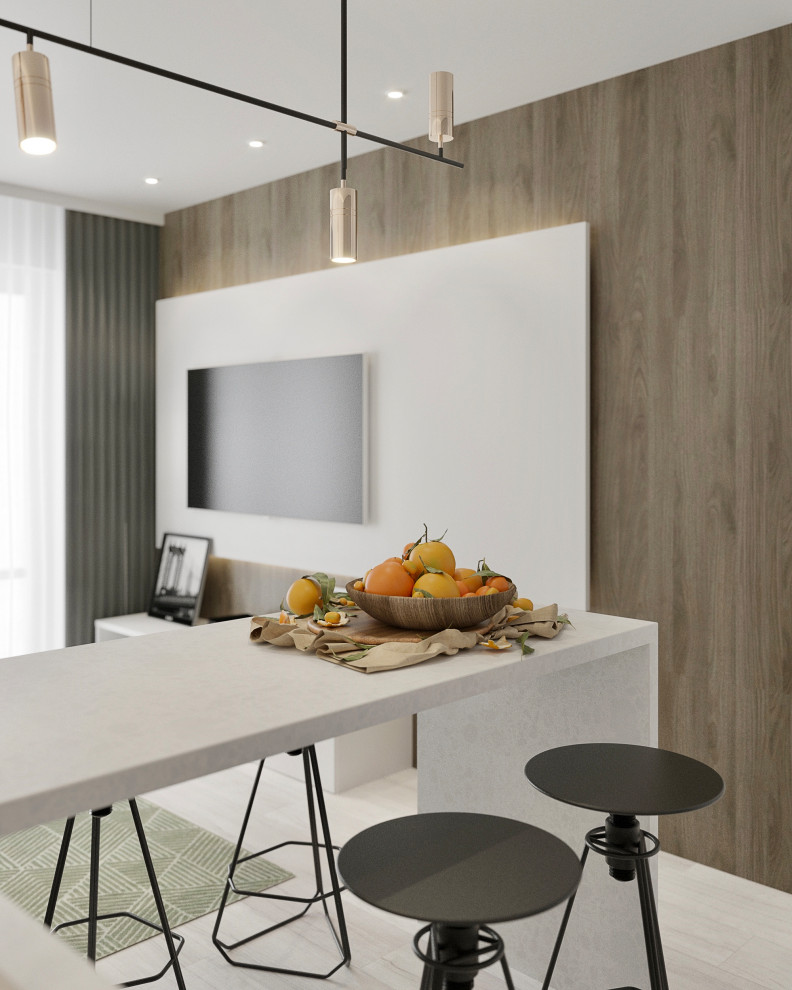 Дизайн интерьера маленькой кухни с барной стойкой, диваном и ТV зоной.