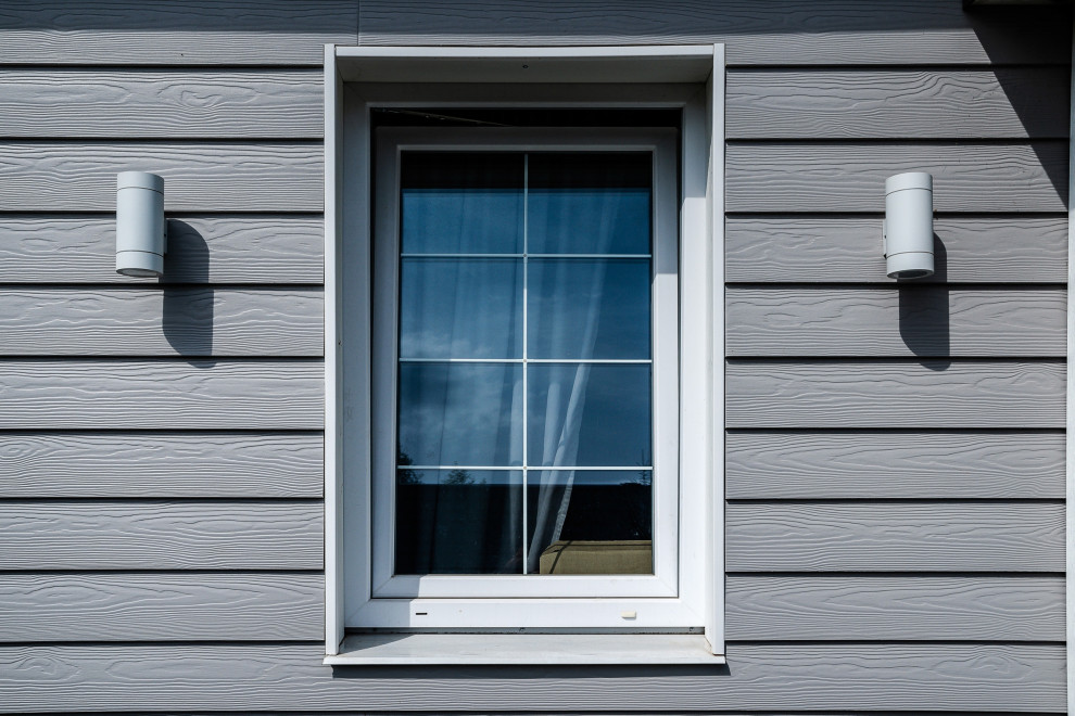 Одноэтажный серый дом